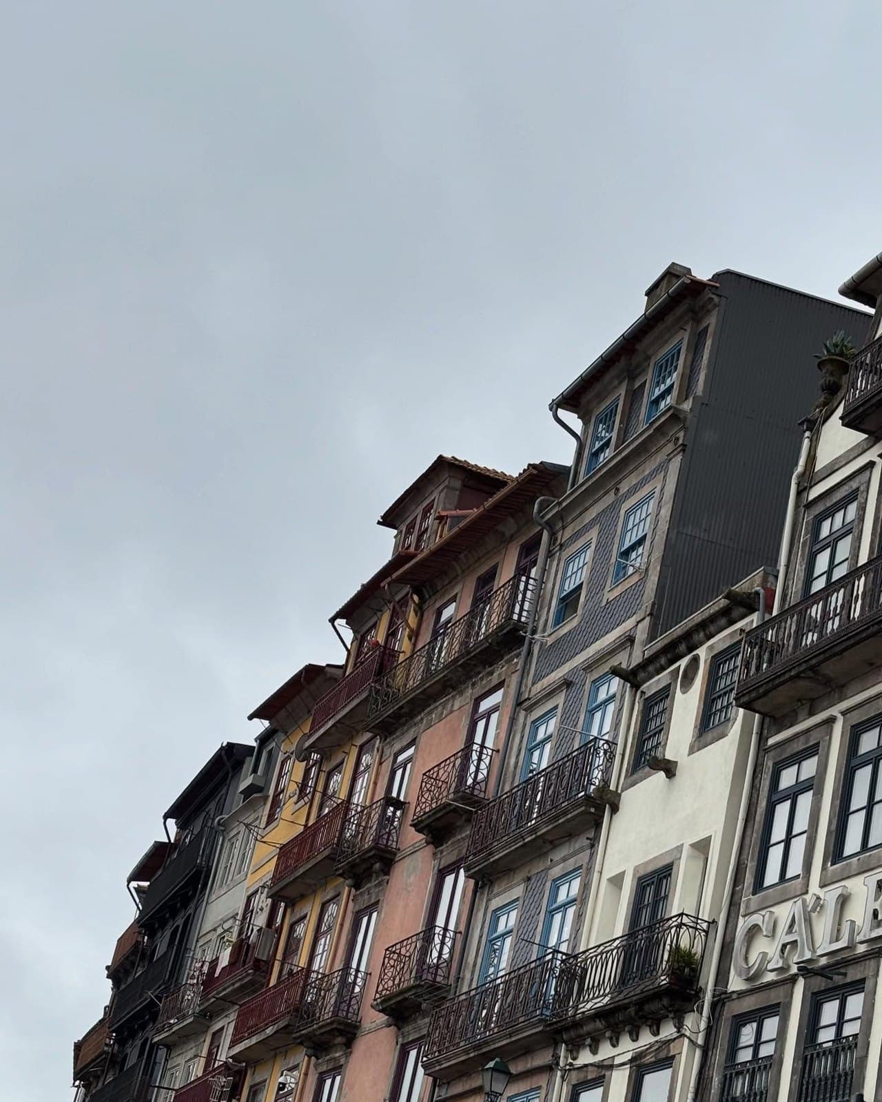 Colourful Ribeira townhouses with iron balconies